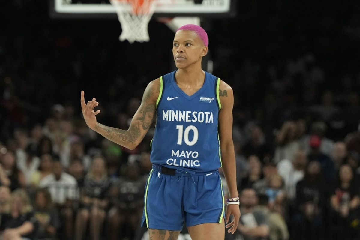 Aug 2, 2025; Las Vegas, Nevada, USA; Minnesota Lynx guard Courtney Williams (10) celebrates a 3-pointer scored by Minnesota Lynx guard Natisha Hiedeman (2)(not pictured) against the Las Vegas Aces during the second quarter of their game at Michelob Ultra Arena. Mandatory Credit: Candice Ward-Imagn Images