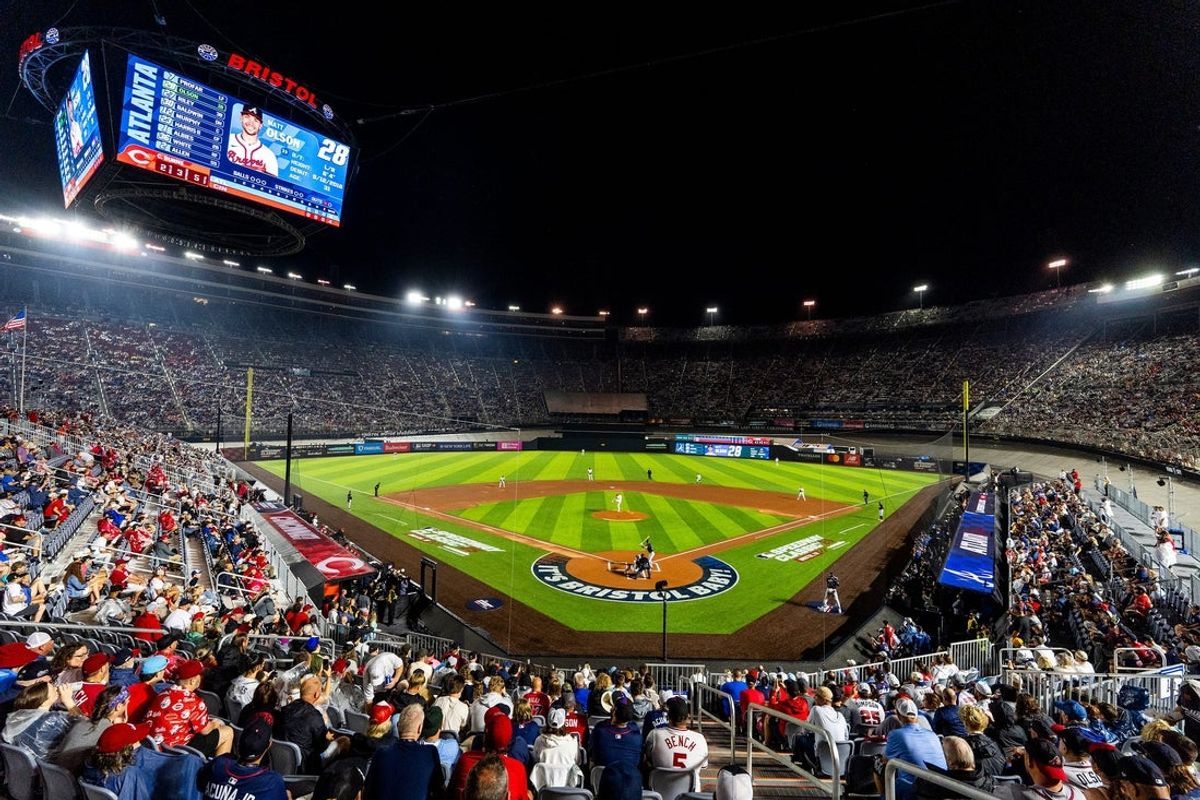 Cincinnati Reds pitcher Chase Burns throws a pitch to Atlanta Braves batter Matt Olson in the MLB Speedway Classic held at Bristol Motor Speedway in Bristol, Tenn., on August 2, 2025.