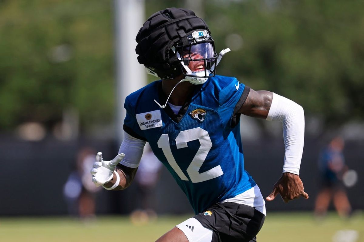Jacksonville Jaguars wide receiver Travis Hunter (12) runs after an NFL training camp session at the Miller Electric Center, Sunday, Aug. 3, 2025, in Jacksonville, Fla. [Corey Perrine/Florida Times-Union]