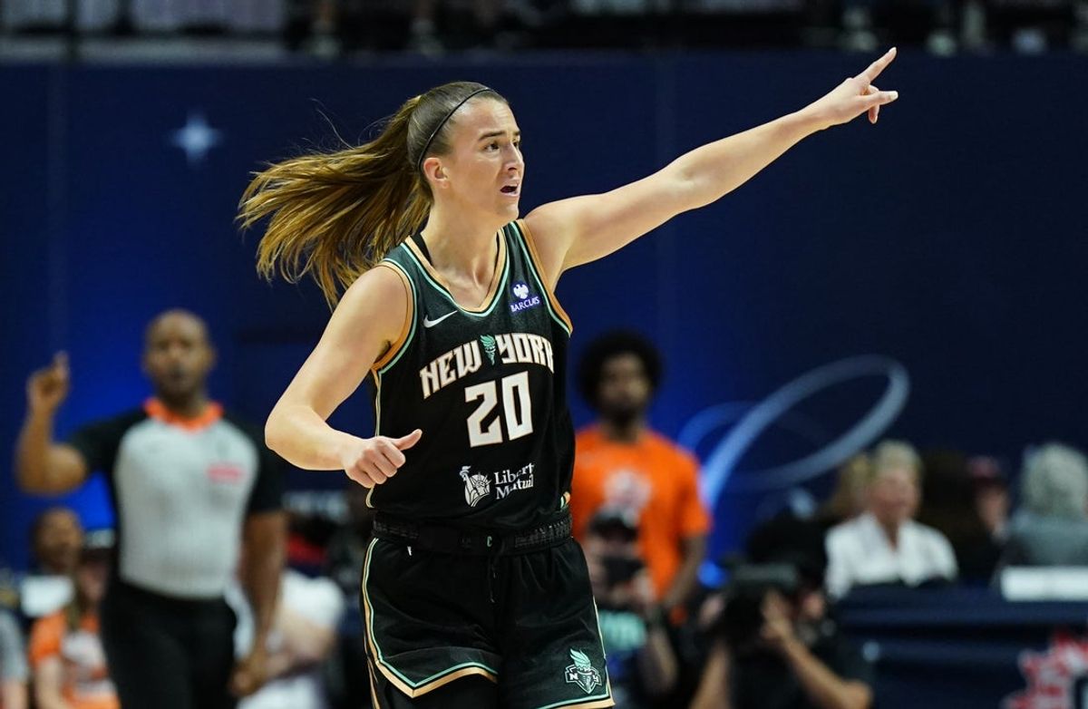 Aug 3, 2025; Uncasville, Connecticut, USA; New York Liberty guard Sabrina Ionescu (20) returns up court against the Connecticut Sun in the first half at Mohegan Sun Arena. Mandatory Credit: David Butler II-Imagn Images
