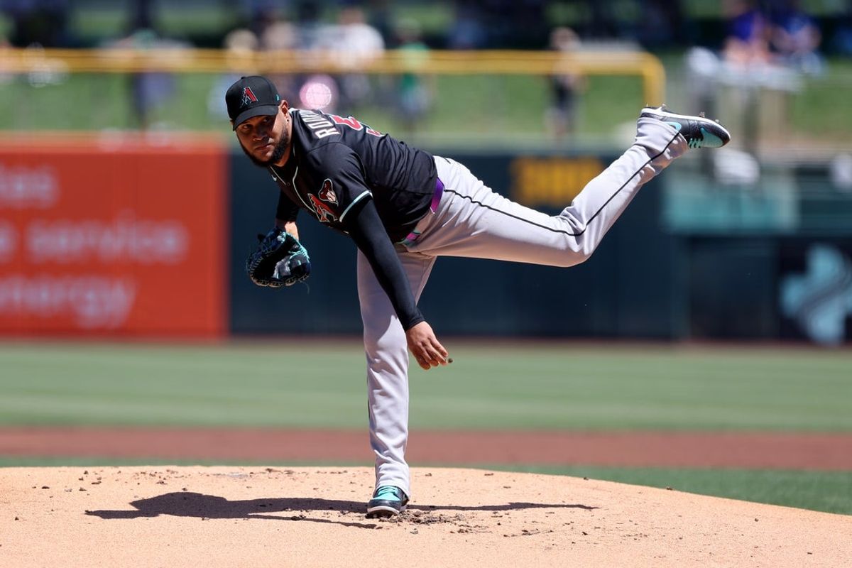Aug 3, 2025; West Sacramento, California, USA; Arizona Diamondbacks starting pitcher Eduardo Rodriguez (57) throws a pitch against the Athletics during the first inning at Sutter Health Park. Mandatory Credit: Dennis Lee-Imagn Images