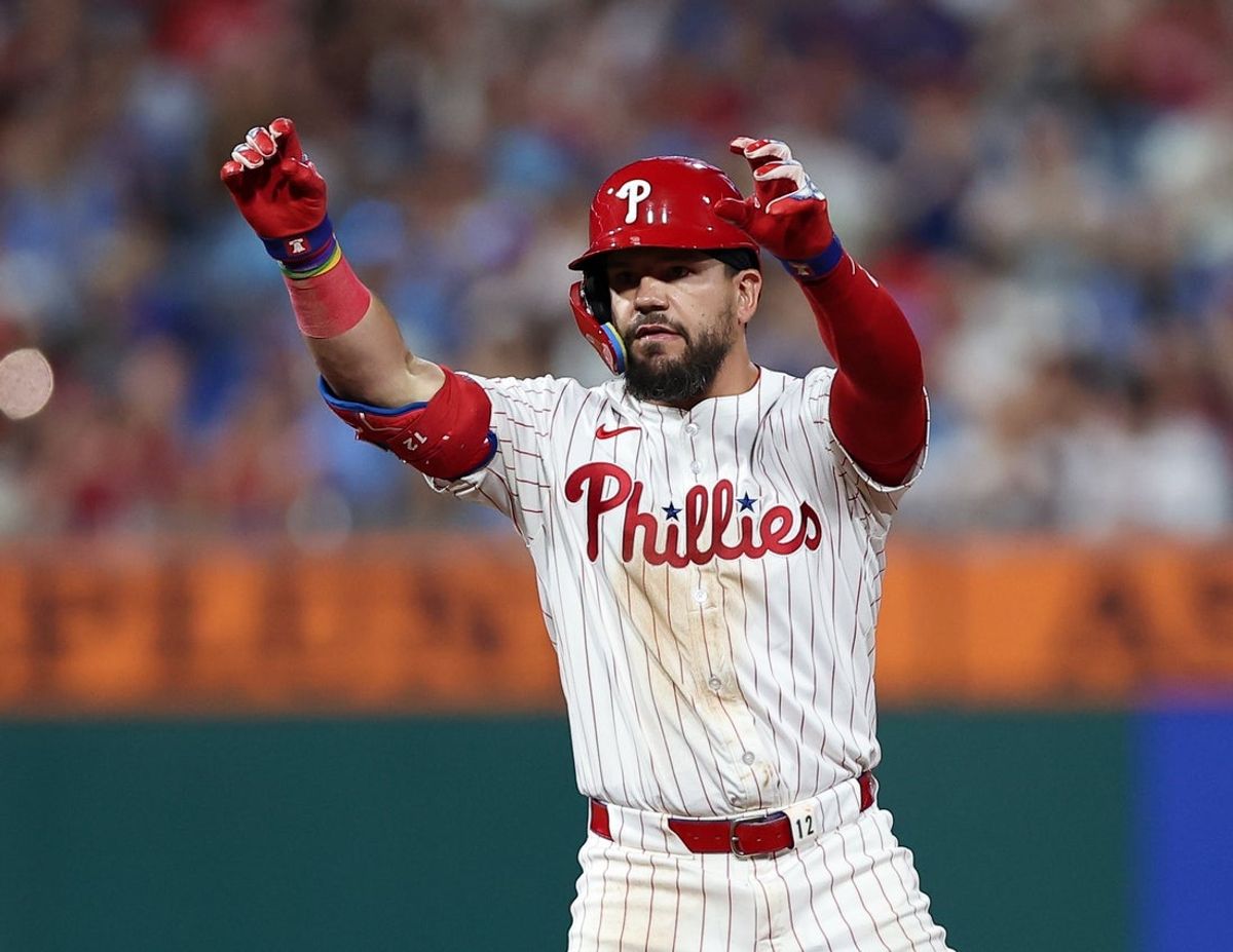 Aug 3, 2025; Philadelphia, Pennsylvania, USA; Philadelphia Phillies outfielder Kyle Schwarber (12) reacts after hitting a double against the Detroit Tigers during the sixth inning at Citizens Bank Park. Mandatory Credit: Bill Streicher-Imagn Images