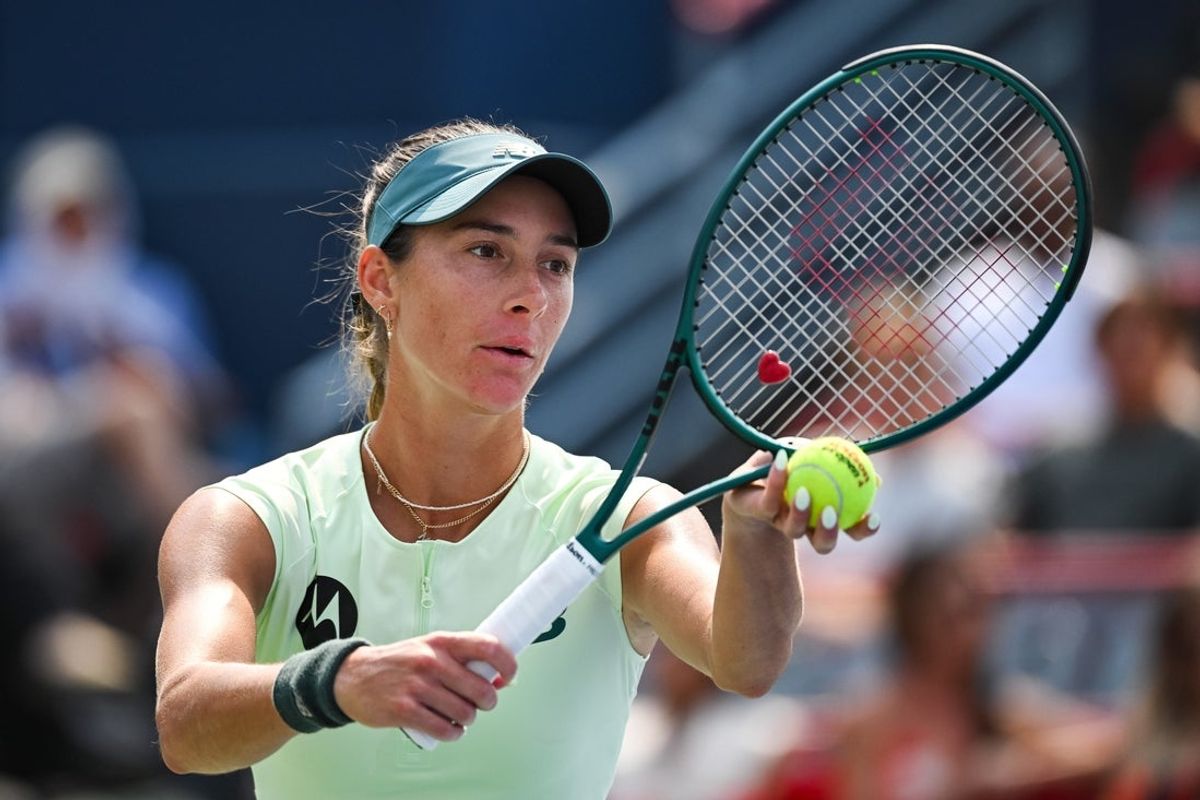 Aug 2, 2025; Montreal, QC, Canada; Mccartney Kessler (USA) serves the ball to Marta Kostyuk (UKR) in fourth round play at IGA Stadium. Mandatory Credit: David Kirouac-Imagn Images
