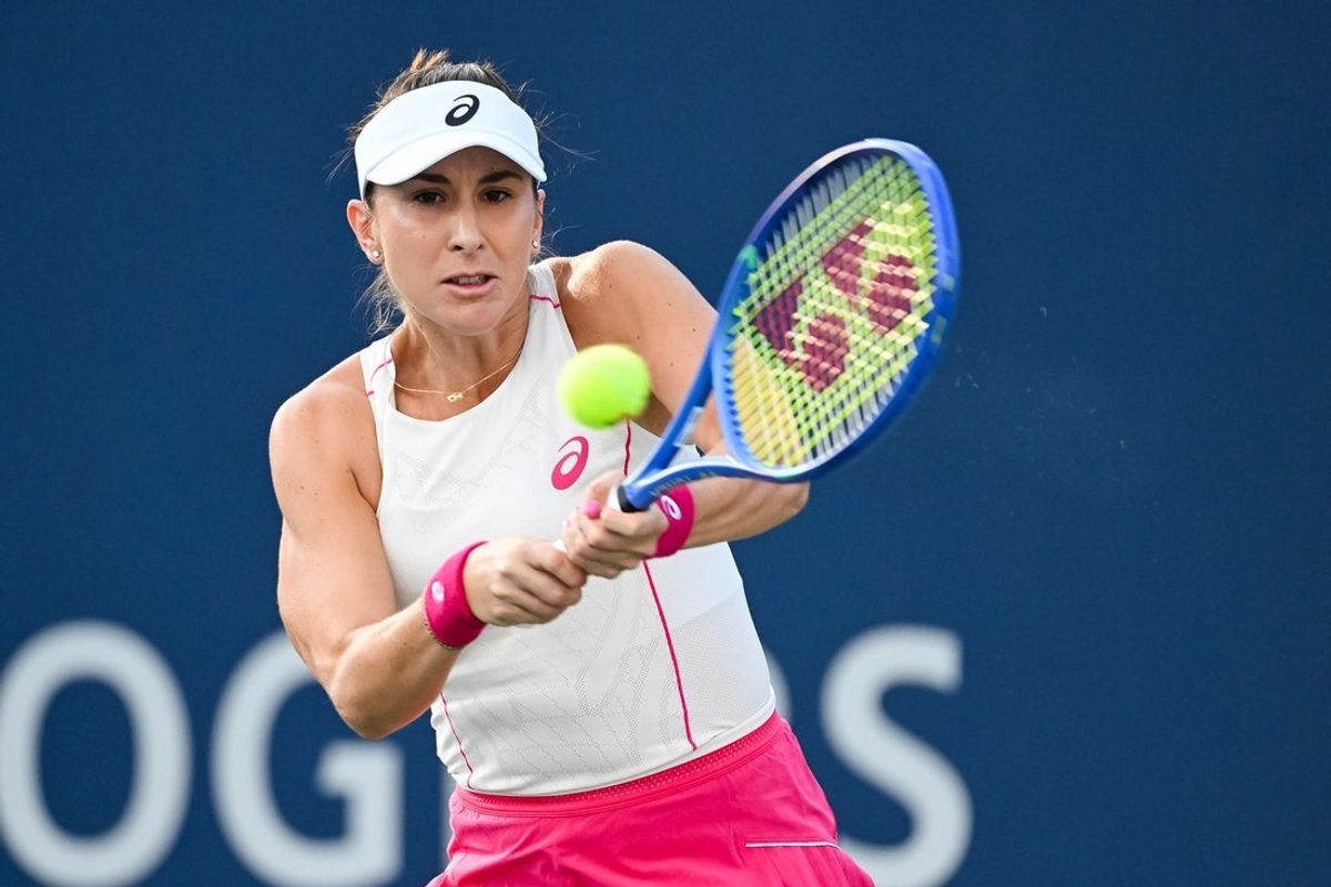 Aug 1, 2025; Montreal, QC, Canada; Belinda Bencic (SUI) returns the ball to Karolina Muchova (CZE) in third round play at IGA Stadium. Mandatory Credit: David Kirouac-Imagn Images