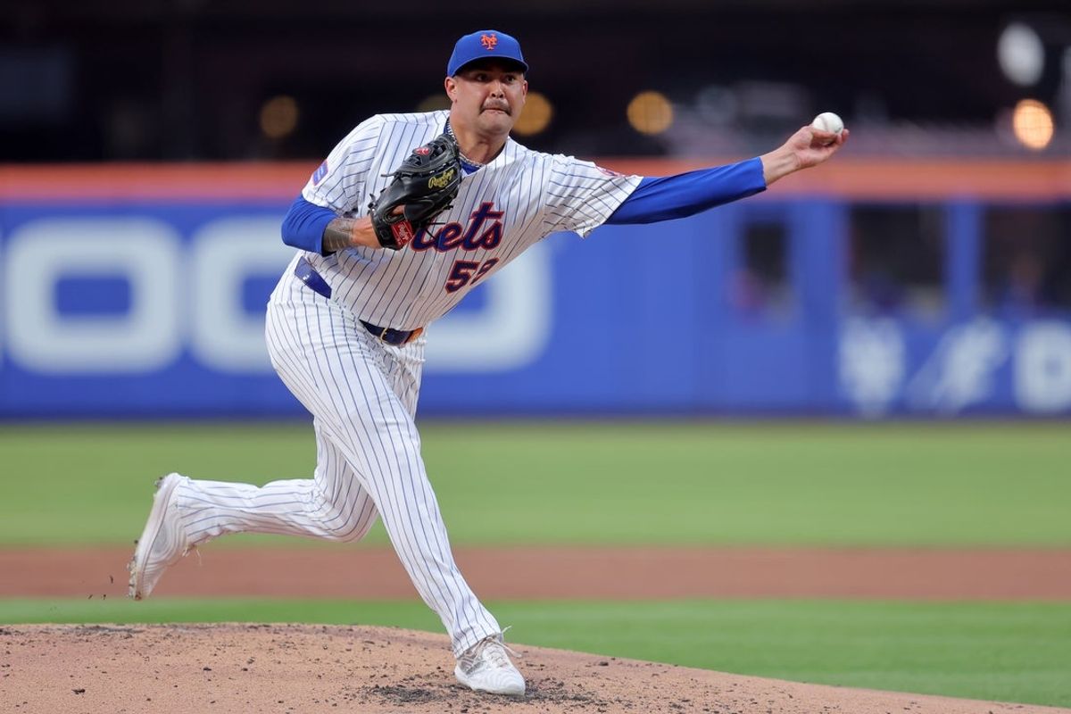 Aug 4, 2025; New York City, New York, USA; New York Mets starting pitcher Sean Manaea (59) pitches against the Cleveland Guardians during the third inning at Citi Field. Mandatory Credit: Brad Penner-Imagn Images
