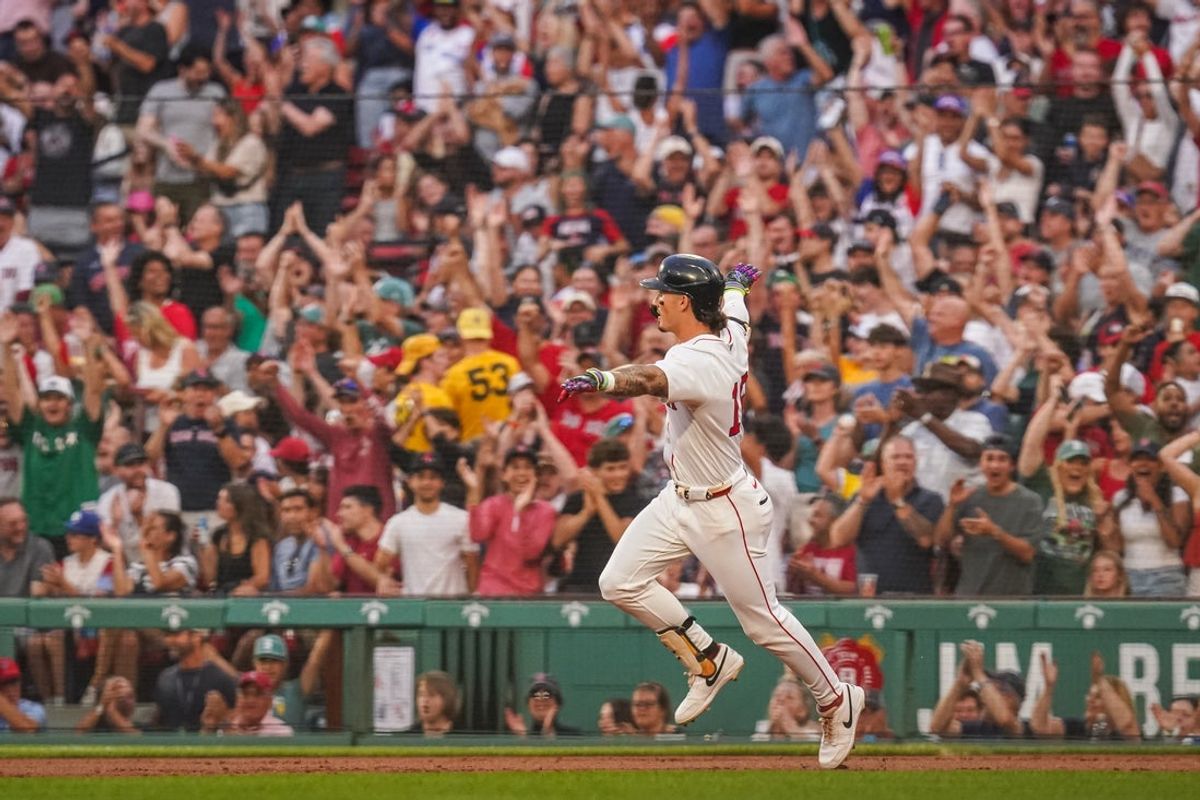 Aug 4, 2025; Boston, Massachusetts, USA; Boston Red Sox outfielder Jarren Duran (16) hits a three run home run against the Kansas City Royals in the first inning at Fenway Park. Mandatory Credit: David Butler II-Imagn Images