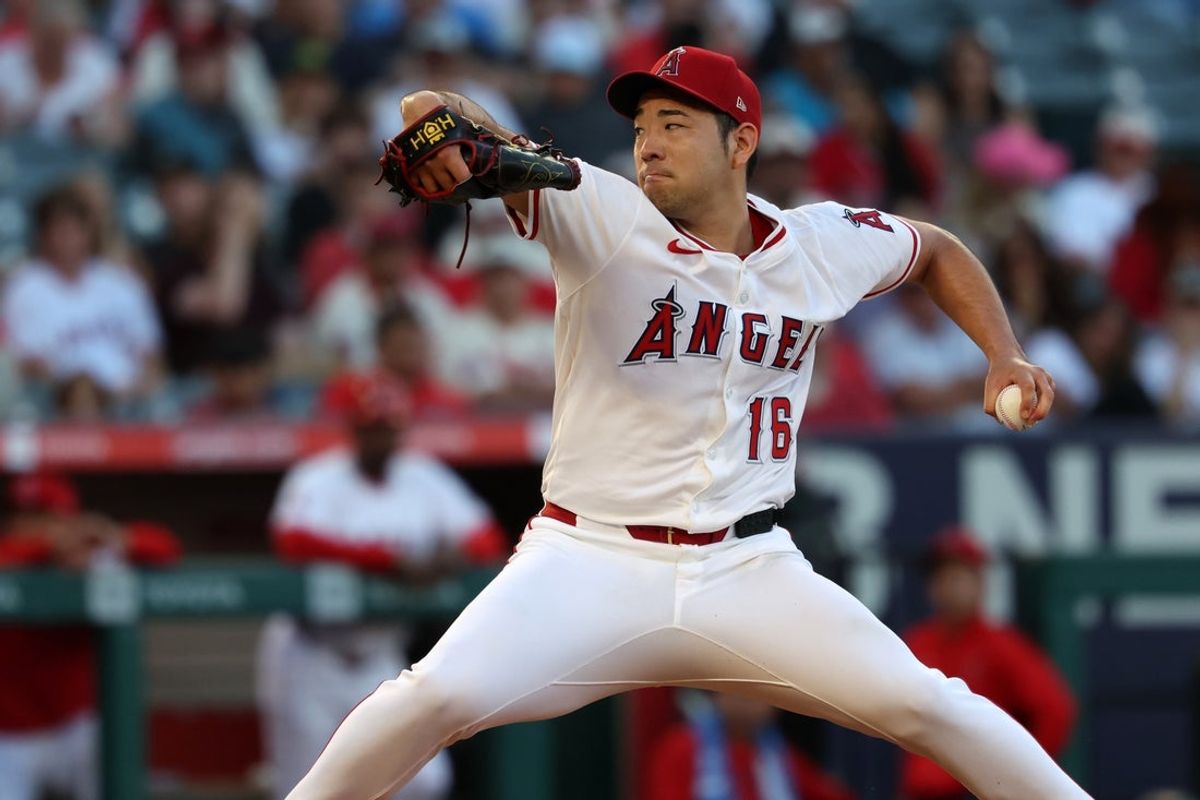 Aug 4, 2025; Anaheim, California, USA;  Los Angeles Angels starting pitcher Yusei Kikuchi (16) pitches during the second inning against the Tampa Bay Rays at Angel Stadium. Mandatory Credit: Kiyoshi Mio-Imagn Images