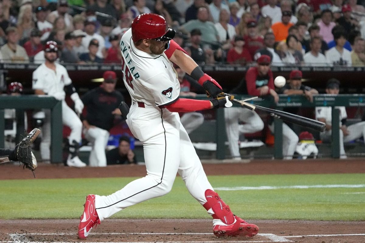 Aug 4, 2025; Phoenix, Arizona, USA; Arizona Diamondbacks first base Tyler Locklear (28) breaks his bat against the San Diego Padres in the first inning at Chase Field. Mandatory Credit: Rick Scuteri-Imagn Images
