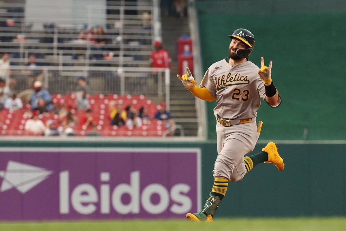 Aug 5, 2025; Washington, District of Columbia, USA; Athletics catcher Shea Langeliers (23) gestures to his dugout while rounding the bases after hitting a leadoff home run against the Washington Nationals during the first inning at Nationals Park. Mandatory Credit: Geoff Burke-Imagn Images
