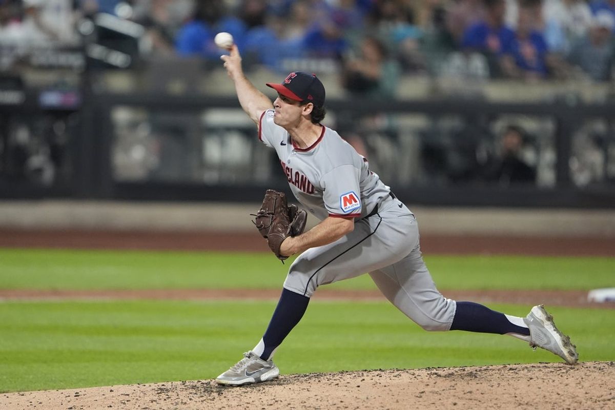 Aug 5, 2025; New York City, New York, USA; Cleveland Guardians pitcher Matt Festa (52) delivers a pitch against the New York Mets during the sixth inning at Citi Field. Mandatory Credit: Gregory Fisher-Imagn Images