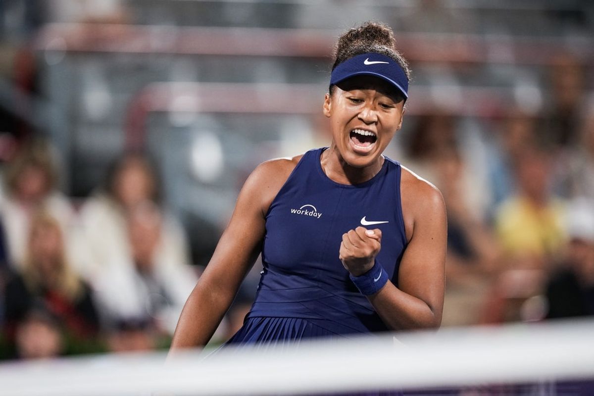 Aug 5, 2025; Montreal, QC, Canada; Naomi Osaka (JPN) reacts after winning a point against Elina Svitolina (UKR) in quarterfinal play at IGA Stadium. Mandatory Credit: David Kirouac-Imagn Images