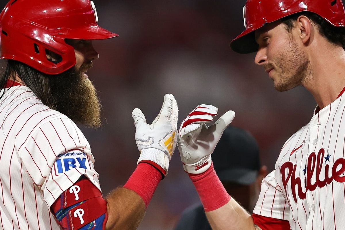 Aug 5, 2025; Philadelphia, Pennsylvania, USA; Philadelphia Phillies outfielder Brandon Marsh (L) celebrates with outfielder Max Kepler (R) after his home run during the eighth inning against the Baltimore Orioles at Citizens Bank Park. Mandatory Credit: Bill Streicher-Imagn Images