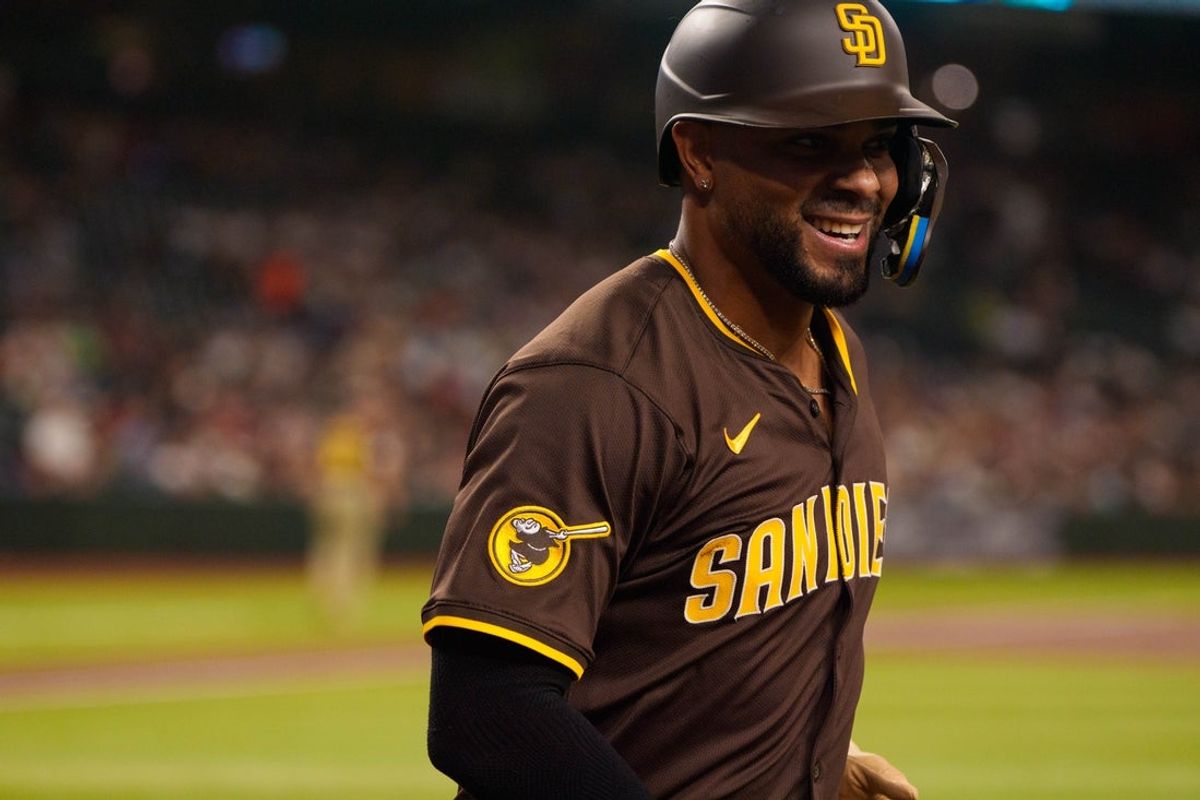 Aug 5, 2025; Phoenix, Arizona, USA; San Diego Padres infielder Xander Bogaerts (2) reacts after hitting a home run in the second inning against the Arizona Diamondbacks at Chase Field. Mandatory Credit: Allan Henry-Imagn Images