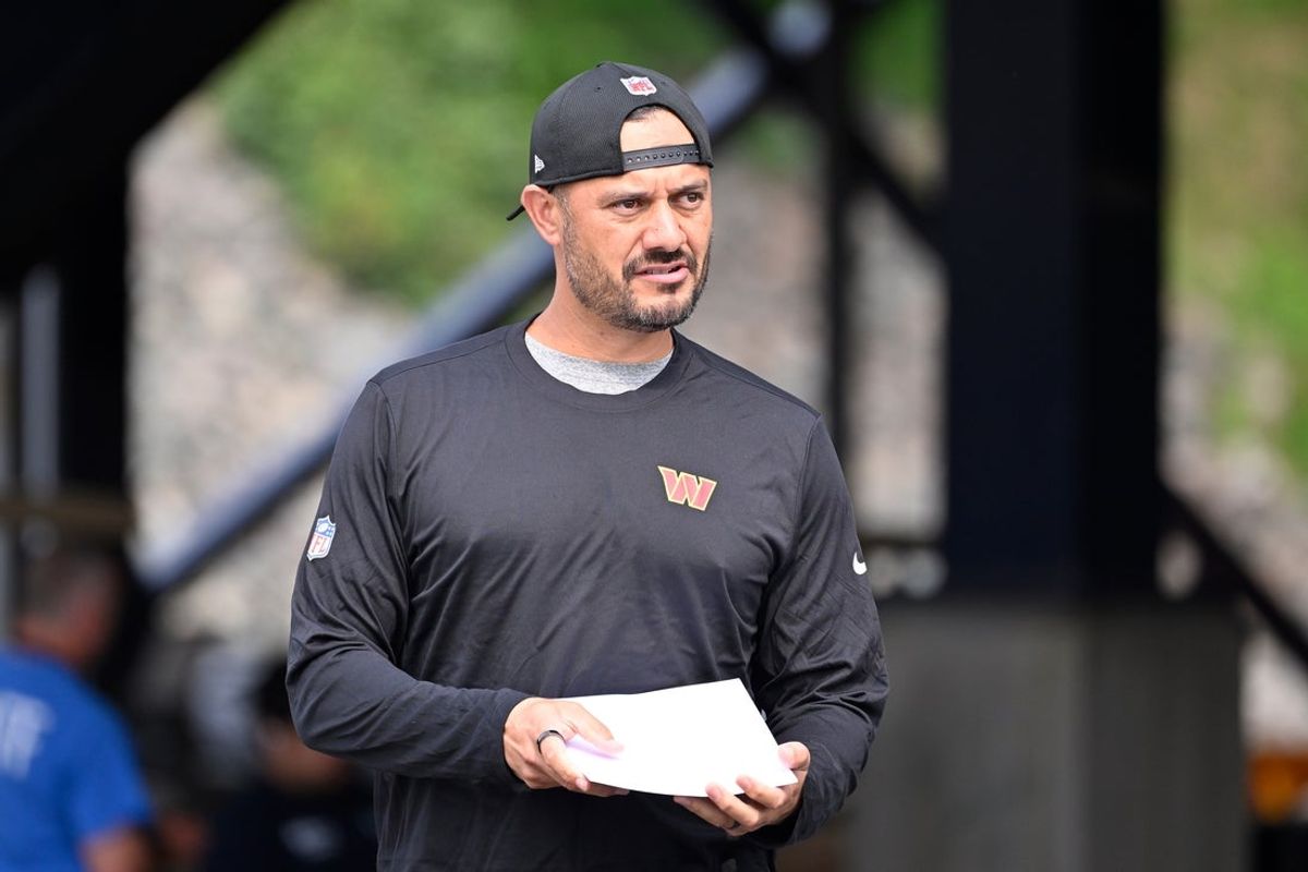 Aug 6, 2025; Foxborough, MA, USA; Washington Commanders quarterbacks coach Tavita Pritchard arrives at training camp at Gillette Stadium. Mandatory Credit: Eric Canha-Imagn Images