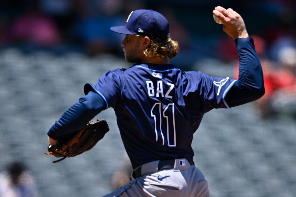 Aug 6, 2025; Anaheim, California, USA; Tampa Bay Rays starting pitcher Shane Baz (11) delivers a pitch during the first inning against the Los Angeles Angels at Angel Stadium of Anaheim. Mandatory Credit: Kelvin Kuo-Imagn Images