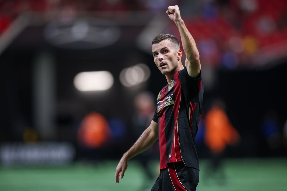 Aug 6, 2025; Atlanta, GA, USA; Atlanta United defender Brooks Lennon (11) celebrates after a victory over Atlas at Mercedes-Benz Stadium. Mandatory Credit: Brett Davis-Imagn Images