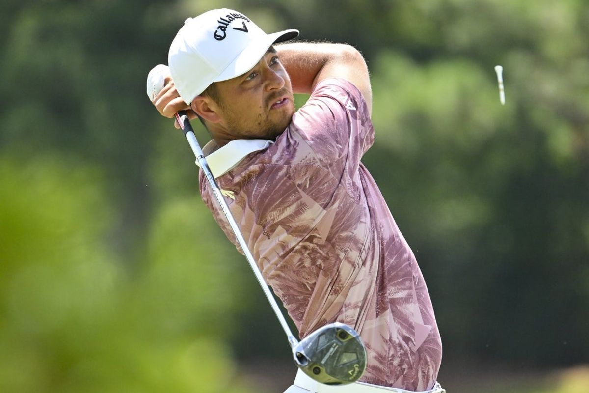 Aug 7, 2025; Memphis, Tennessee, USA; Xander Schauffele plays his shot from the third tee during the first round of the FedEx St. Jude Championship golf tournament. Mandatory Credit: Steve Roberts-Imagn Images