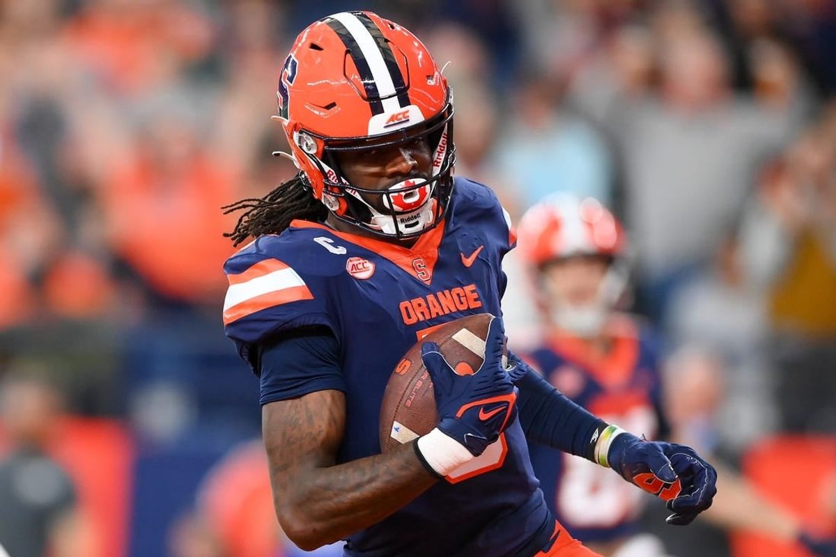 Nov 25, 2023; Syracuse, New York, USA; Syracuse Orange wide receiver Damien Alford (5) runs into the end zone for a touchdown against the Wake Forest Demon Deacons during the second half at the JMA Wireless Dome.