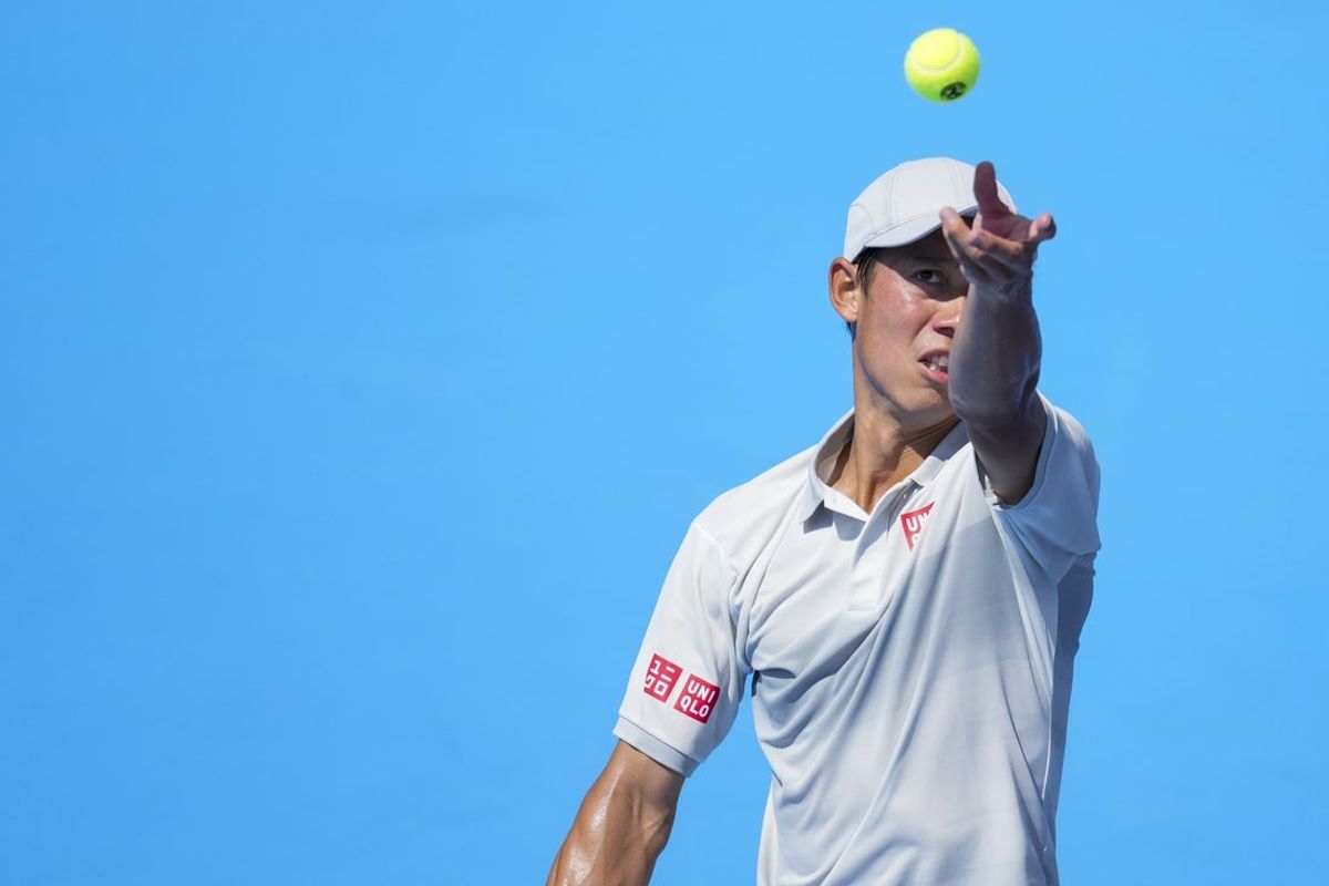 Aug 8, 2025; Cincinnati, OH, USA; Kei Nishikori (JPN) serves against Camilo Ugo Carabelli (ARG) during the Cincinnati Open at the Lindner Family Tennis Center. Mandatory Credit: Aaron Doster-Imagn Images