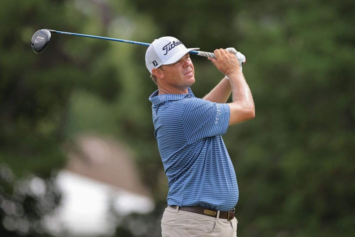 Jul 31, 2025; Greensboro, North Carolina, USA; Patton Kizzire drives off the 11th tee box during the first round of the Wyndham Championship golf tournament. Mandatory Credit: Allison Lawhon-Imagn Images