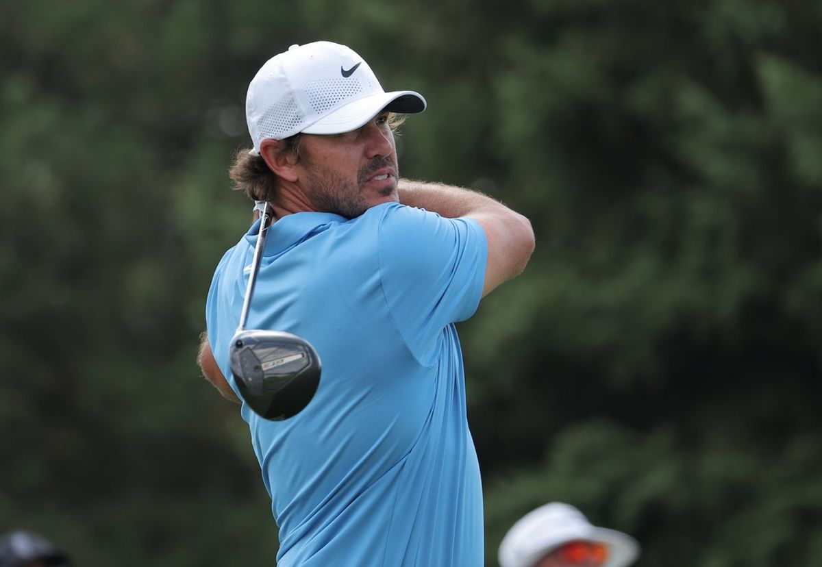 AUG 08, 2025; Bolingbrook, Illinois, USA; Brooks Koepka of the Smash GC tees off on the on the 14th hole during the first round of the LIV Golf Chicago tournament at Bolingbrook Golf Club. Mandatory Credit: Melissa Tamez-Imagn Images
