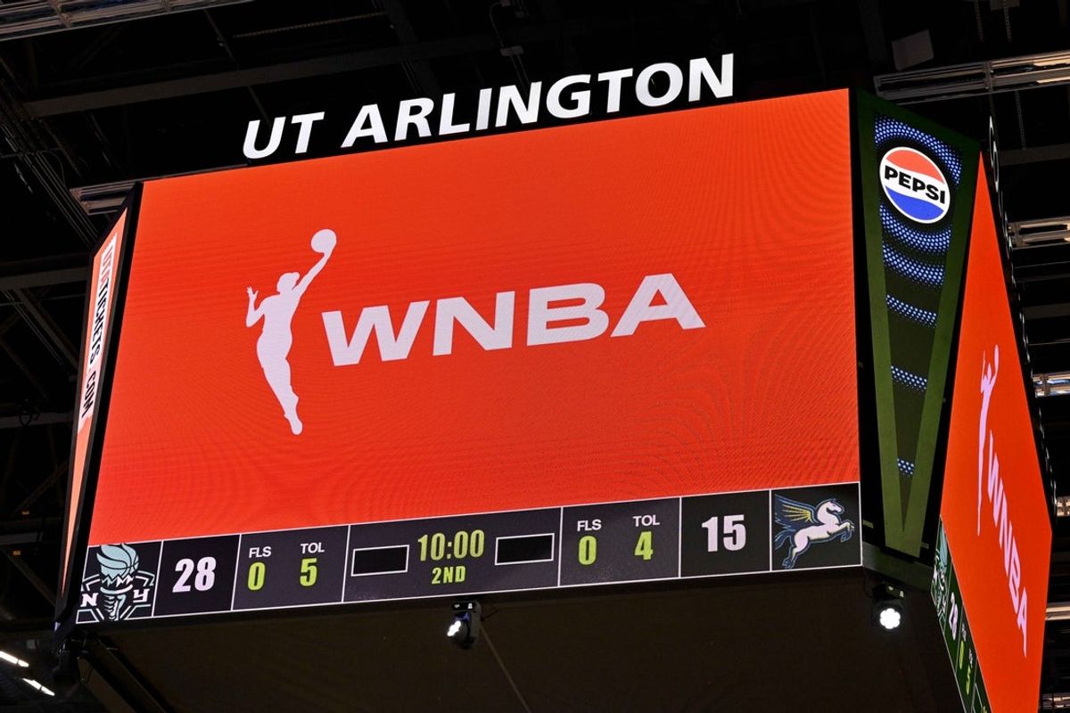 Aug 8, 2025; Arlington, Texas, USA; A view of the scoreboard and the WNBA logo as an announcement is made about throwing any toys or objects on to the court during the first half of the game etween the Dallas Wings and the New York Liberty at College Park Center. Mandatory Credit: Jerome Miron-Imagn Images