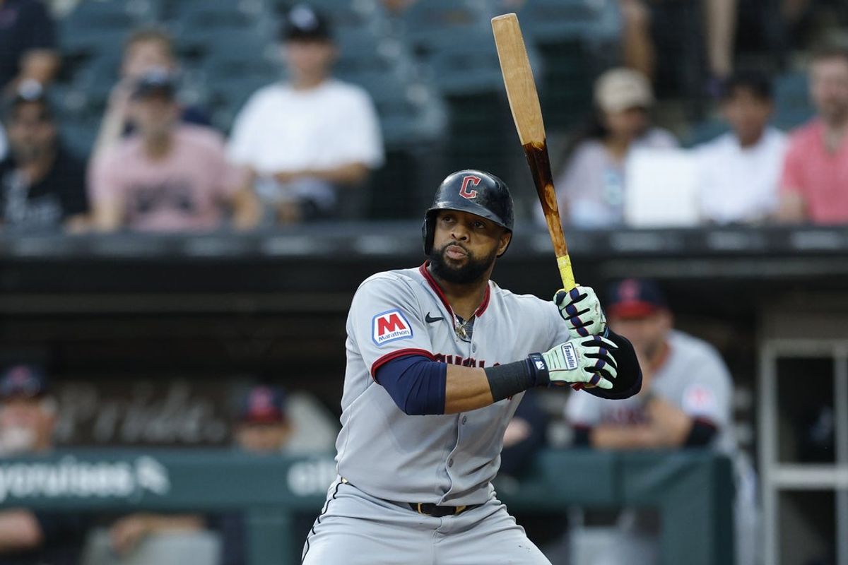 Aug 8, 2025; Chicago, Illinois, USA; Cleveland Guardians first baseman Carlos Santana (41) bats against the Chicago White Sox during the first inning at Rate Field. Mandatory Credit: Kamil Krzaczynski-Imagn Images