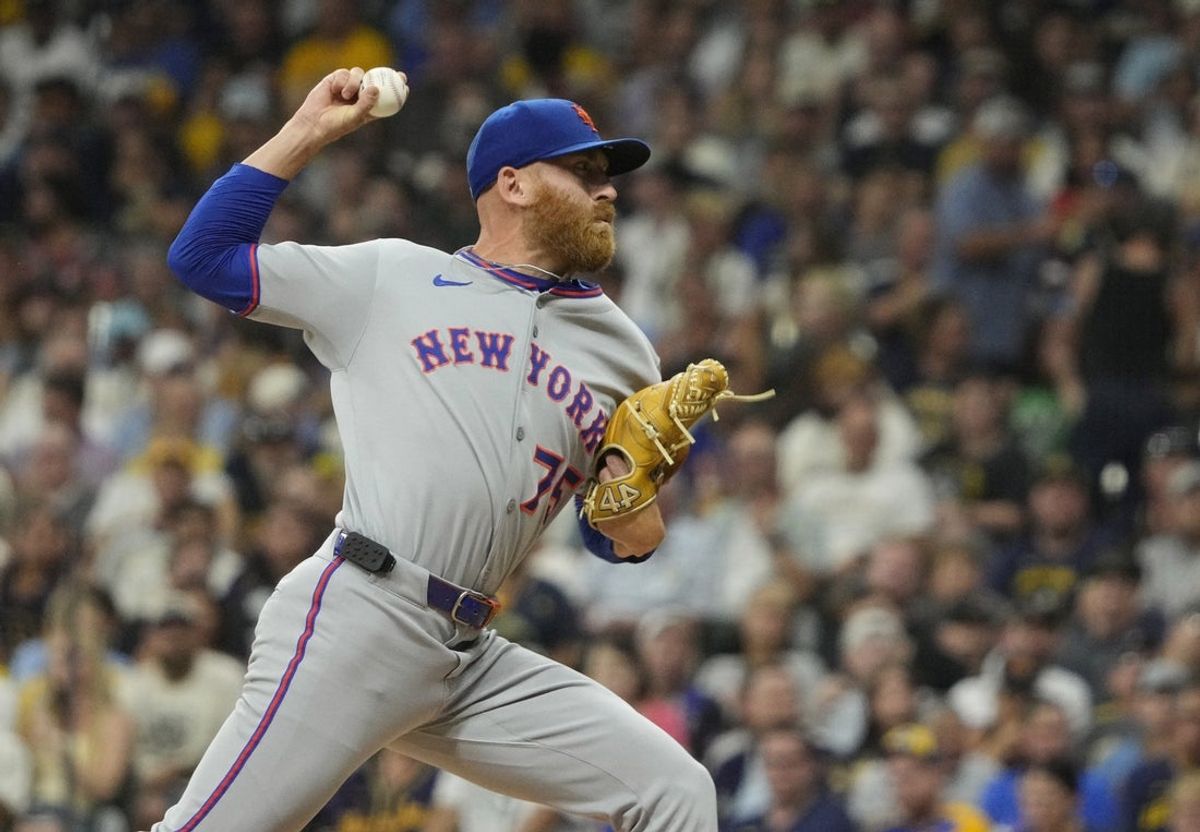 Aug 9, 2025; Milwaukee, Wisconsin, USA; New York Mets pitcher Reed Garrett (75) delivers a pitch against the Milwaukee Brewers in the first inning at American Family Field. Mandatory Credit: Michael McLoone-Imagn Images