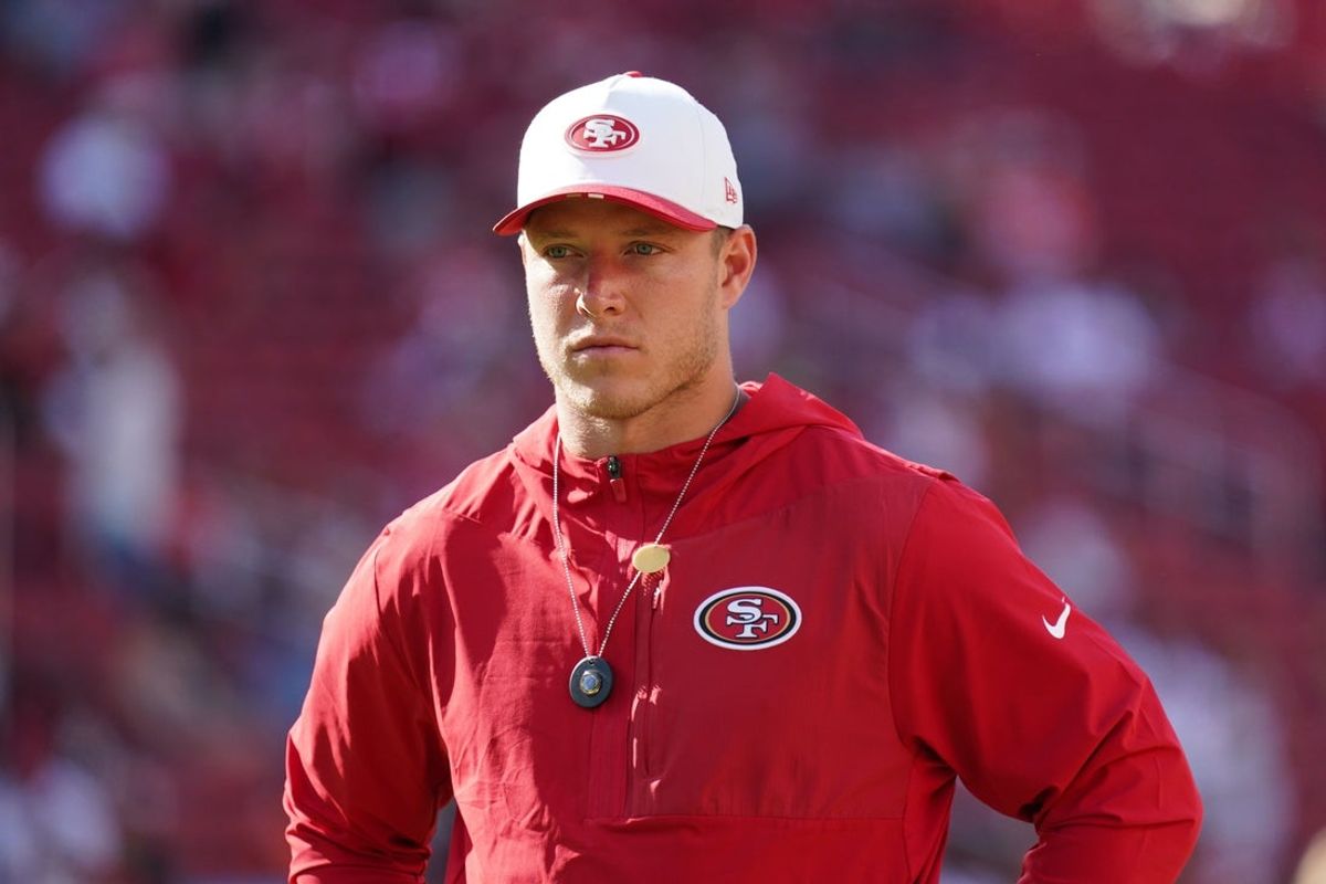 Aug 9, 2025; Santa Clara, California, USA;  San Francisco 49ers running back Christian McCaffrey (23) warms up before the game against the Denver Broncos at Levi's Stadium. Mandatory Credit: David Gonzales-Imagn Images
