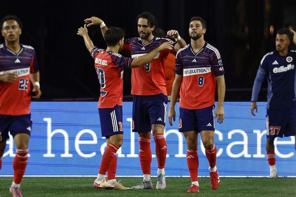 Aug 9, 2025; Foxborough, Massachusetts, USA; New England Revolution forward Leonardo Campana (9) celebrates his goal with midfielder Carles Gil (10) during the second half against D.C. United at Gillette Stadium. Mandatory Credit: Winslow Townson-Imagn Images