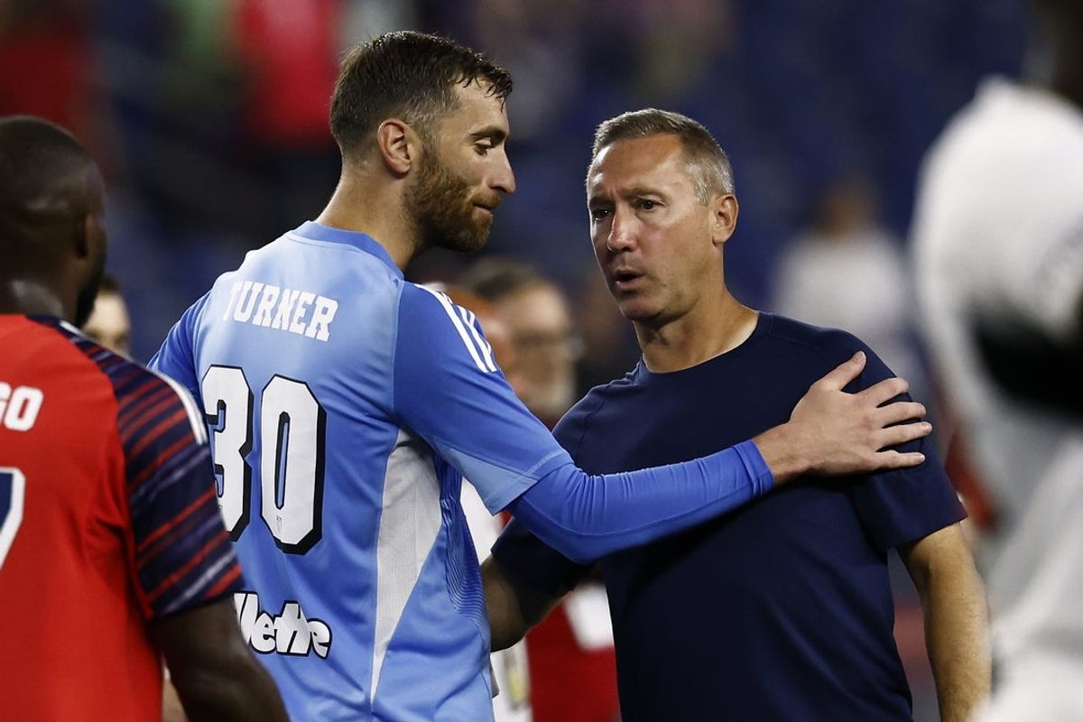Aug 9, 2025; Foxborough, Massachusetts, USA;  New England Revolution goalkeeper Matt Turner (30) is congratulated by head coach Caleb Porter after their 2-0 win over D.C. United at Gillette Stadium. Mandatory Credit: Winslow Townson-Imagn Images