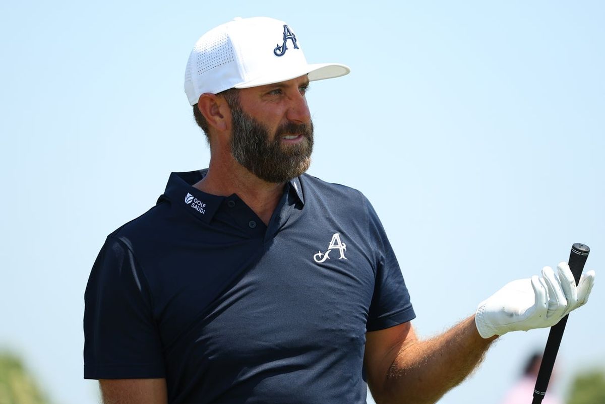 AUG 09, 2025; Bolingbrook, Illinois, USA; Dustin Johnson of the 4Aces GC lines up his shot on fifth hole hole during the second round of the LIV Golf Chicago tournament at Bolingbrook Golf Club. Mandatory Credit: Melissa Tamez-Imagn Images