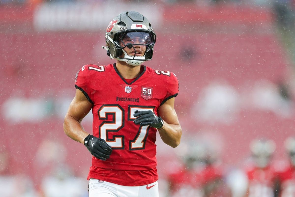 Aug 9, 2025; Tampa, Florida, USA; Tampa Bay Buccaneers cornerback Zyon McCollum (27) warms up before a preseason game against the Tennessee Titans at Raymond James Stadium. Mandatory Credit: Nathan Ray Seebeck-Imagn Images