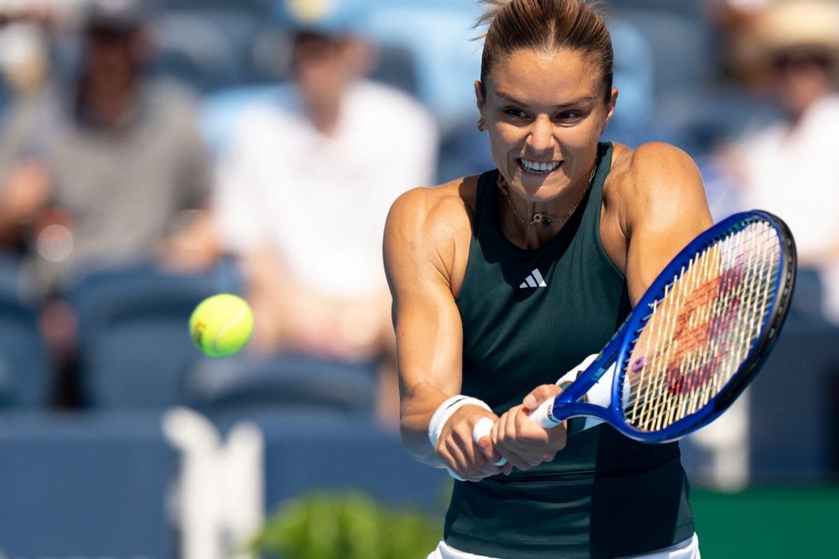 Maria Sakkari, of Greece, returns to Jasmine Paolini, of Italy, during the Cincinnati Open at the Lindner Family Tennis Center in Mason, Ohio, on Aug. 10, 2025.