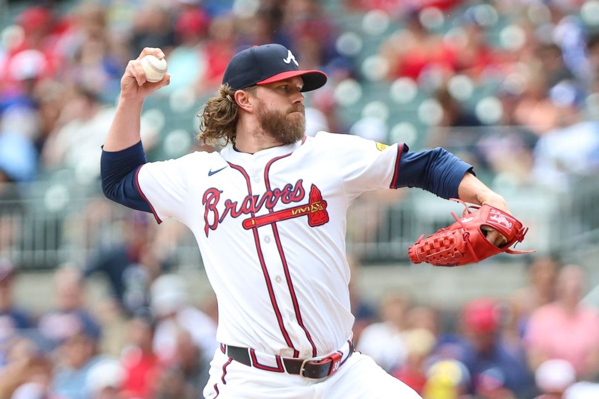 Aug 10, 2025; Cumberland, Georgia, USA; Atlanta Braves pitcher Pierce Johnson (38) pitches the ball against the Miami Marlins during the eighth inning at Truist Park. Mandatory Credit: Jordan Godfree-Imagn Images