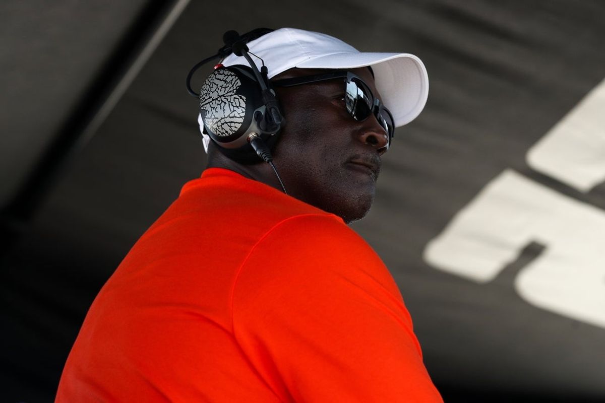 Aug 10, 2025; Watkins Glen, New York, USA; NASCAR Cup Series owner Michael Jordan looks on from atop his team’s pit box during the Go Bowling at The Glen at Watkins Glen International. Mandatory Credit: Matthew O'Haren-Imagn Images