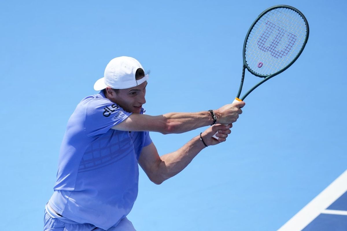 Aug 11, 2025; Cincinnati, OH, USA; Ugo Humbert (FRA) returns a shot against Frances Tiafoe (USA) during the Cincinnati Open at the Lindner Family Tennis Center. Mandatory Credit: Aaron Doster-Imagn Images
