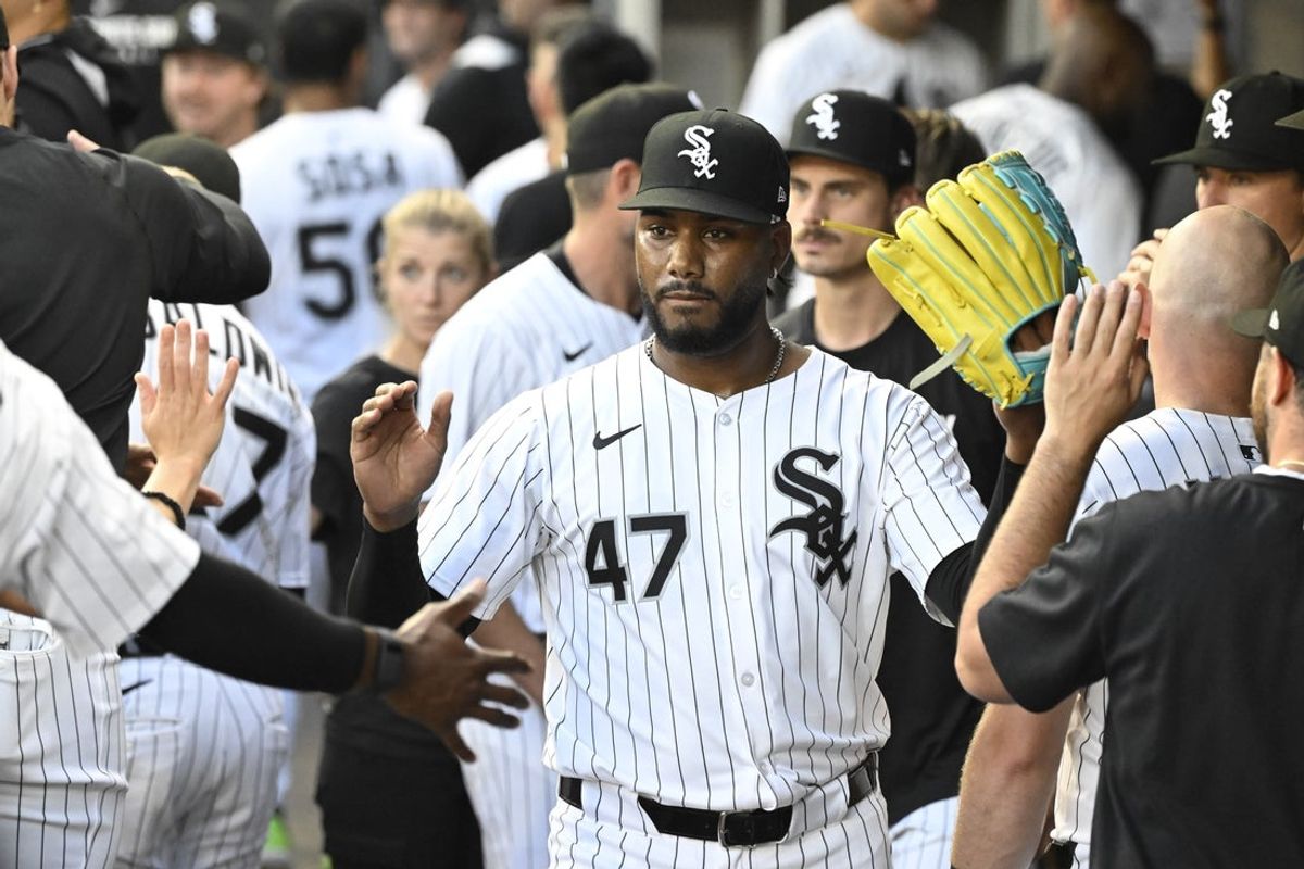 Aug 11, 2025; Chicago, Illinois, USA;  Chicago White Sox pitcher Elvis Peguero (47) with teammates after he delivered during the first inning against the Detroit Tigers at Rate Field. Mandatory Credit: Matt Marton-Imagn Images