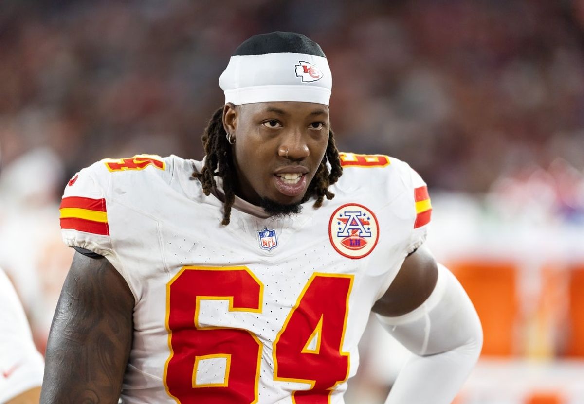 Aug 9, 2025; Glendale, Arizona, USA; Kansas City Chiefs offensive tackle Wanya Morris (64) against the Arizona Cardinals during a preseason NFL game at State Farm Stadium. Mandatory Credit: Mark J. Rebilas-Imagn Images