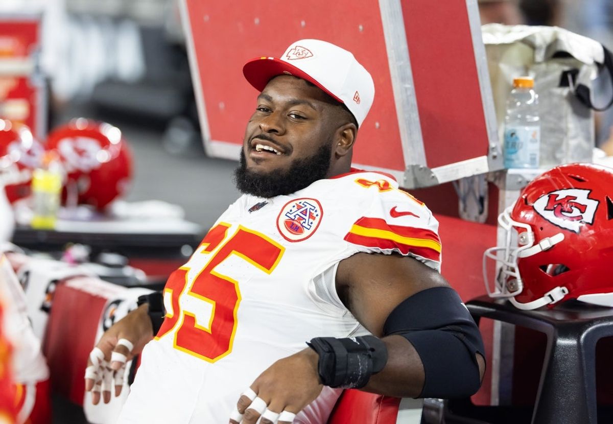 Aug 9, 2025; Glendale, Arizona, USA; Kansas City Chiefs guard Trey Smith (65) against the Arizona Cardinals during a preseason NFL game at State Farm Stadium. Mandatory Credit: Mark J. Rebilas-Imagn Images