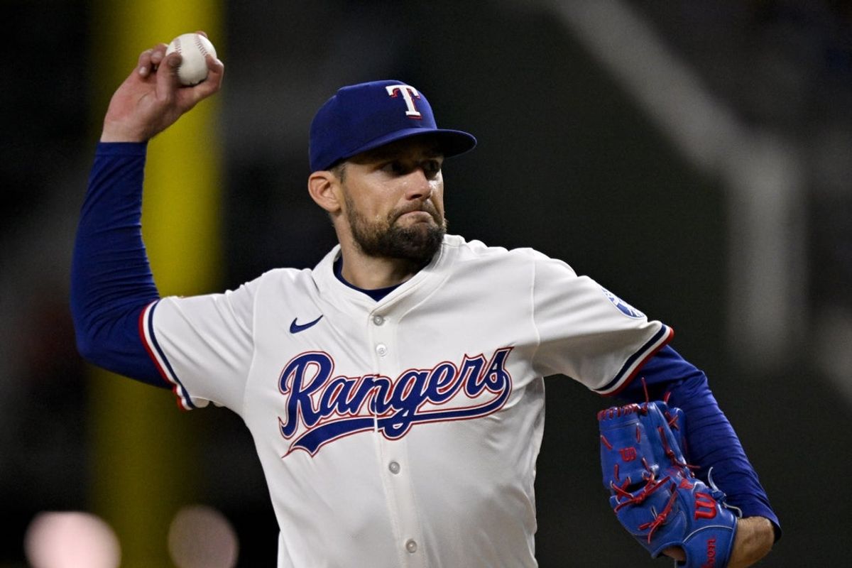 Aug 11, 2025; Arlington, Texas, USA; Texas Rangers starting pitcher Nathan Eovaldi (17) pitches against the Arizona Diamondbacks during the fourth inning at Globe Life Field. Mandatory Credit: Jerome Miron-Imagn Images
