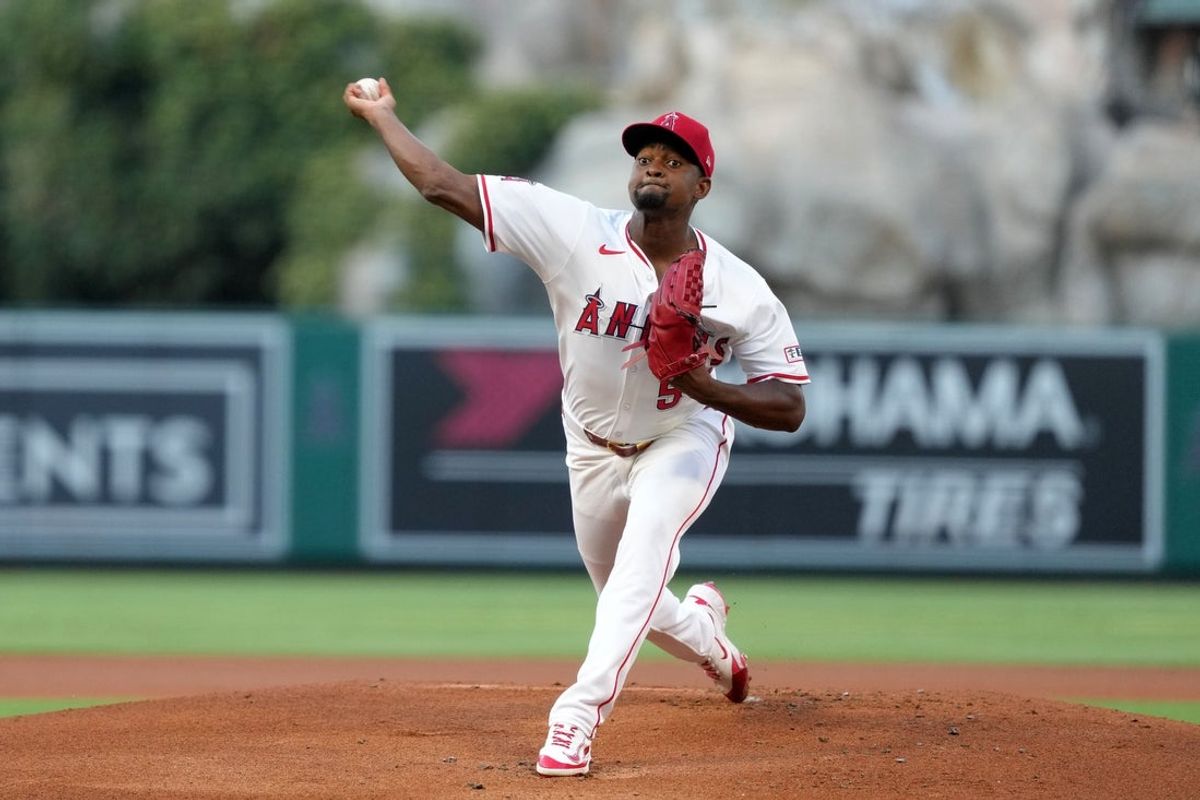 Aug 11, 2025; Anaheim, California, USA; Los Angeles Angels starting pitcher Jose Soriano (59) throws in the first inning against the Los Angeles Dodgers at Angel Stadium. Mandatory Credit: Kirby Lee-Imagn Images