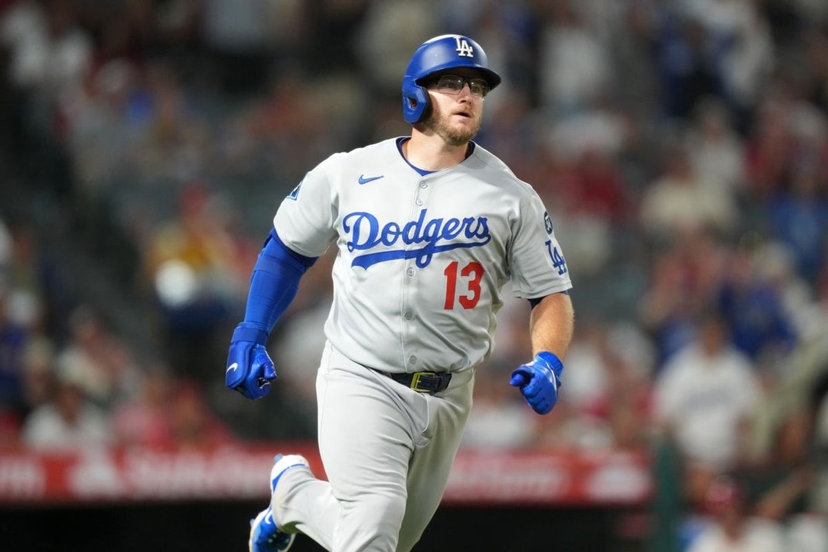 Aug 11, 2025; Anaheim, California, USA; Los Angeles Dodgers third baseman Max Muncy (13) runs the bases after hitting a three-run home run in the eighth inning against the Los Angeles Angels at Angel Stadium. Mandatory Credit: Kirby Lee-Imagn Images