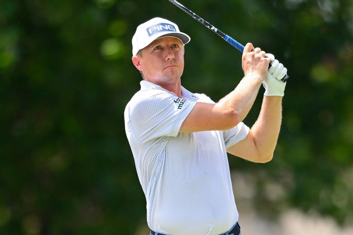 Aug 10, 2025; Memphis, Tennessee, USA; Mackenzie Hughes plays his shot from the 18th tee during the final round of the FedEx St. Jude Championship golf. Mandatory Credit: Steve Roberts-Imagn Images