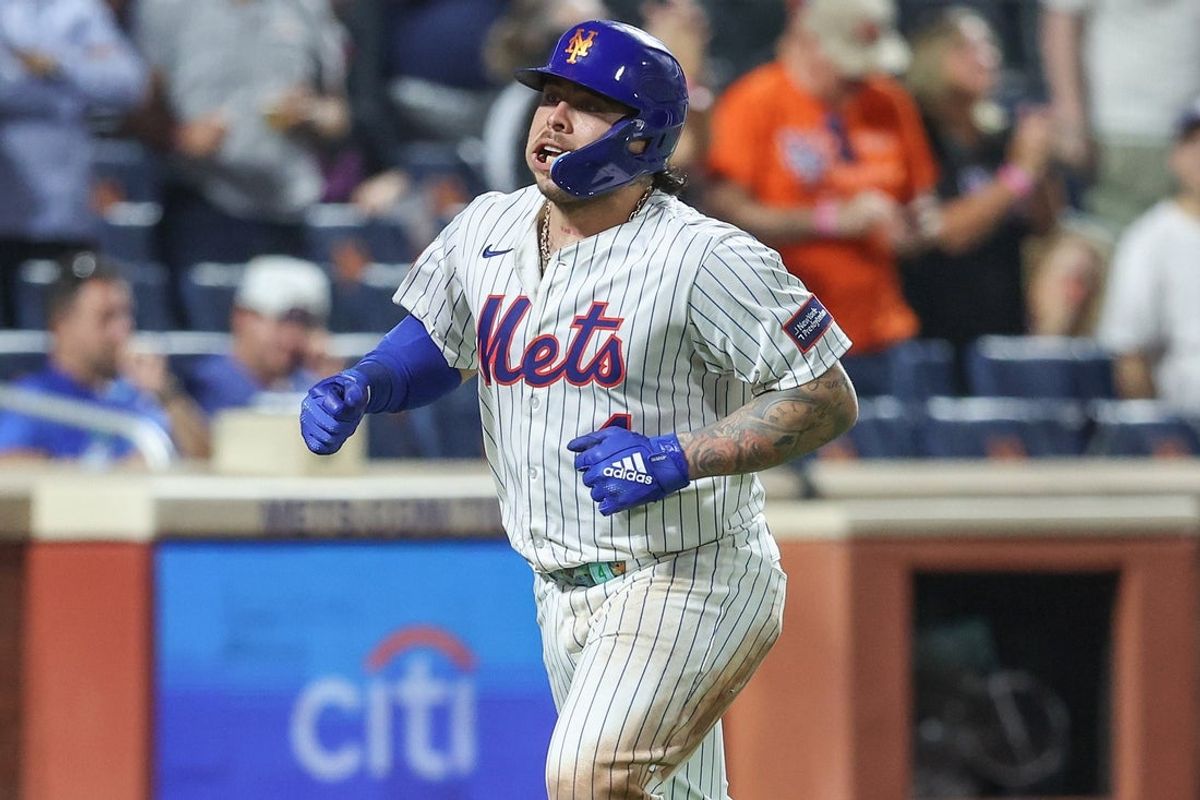 Aug 12, 2025; New York City, New York, USA;  New York Mets catcher Francisco Alvarez (4) reacts after hitting a solo home run in the seventh inning against the Atlanta Braves at Citi Field. Mandatory Credit: Wendell Cruz-Imagn Images