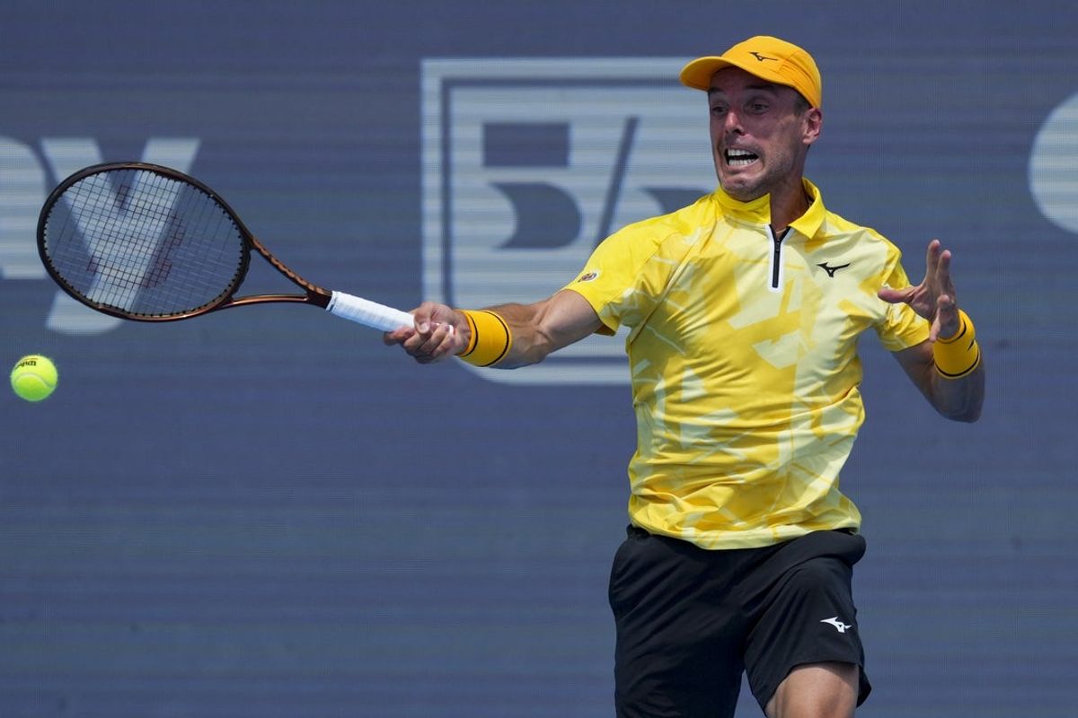 Aug 13, 2025; Cincinnati, OH, USA;  Roberto Bautista Agut (ESP) returns a shot against Ben Shelton (USA) during the Cincinnati Open at the Lindner Family Tennis Center. Mandatory Credit: Aaron Doster-Imagn Images