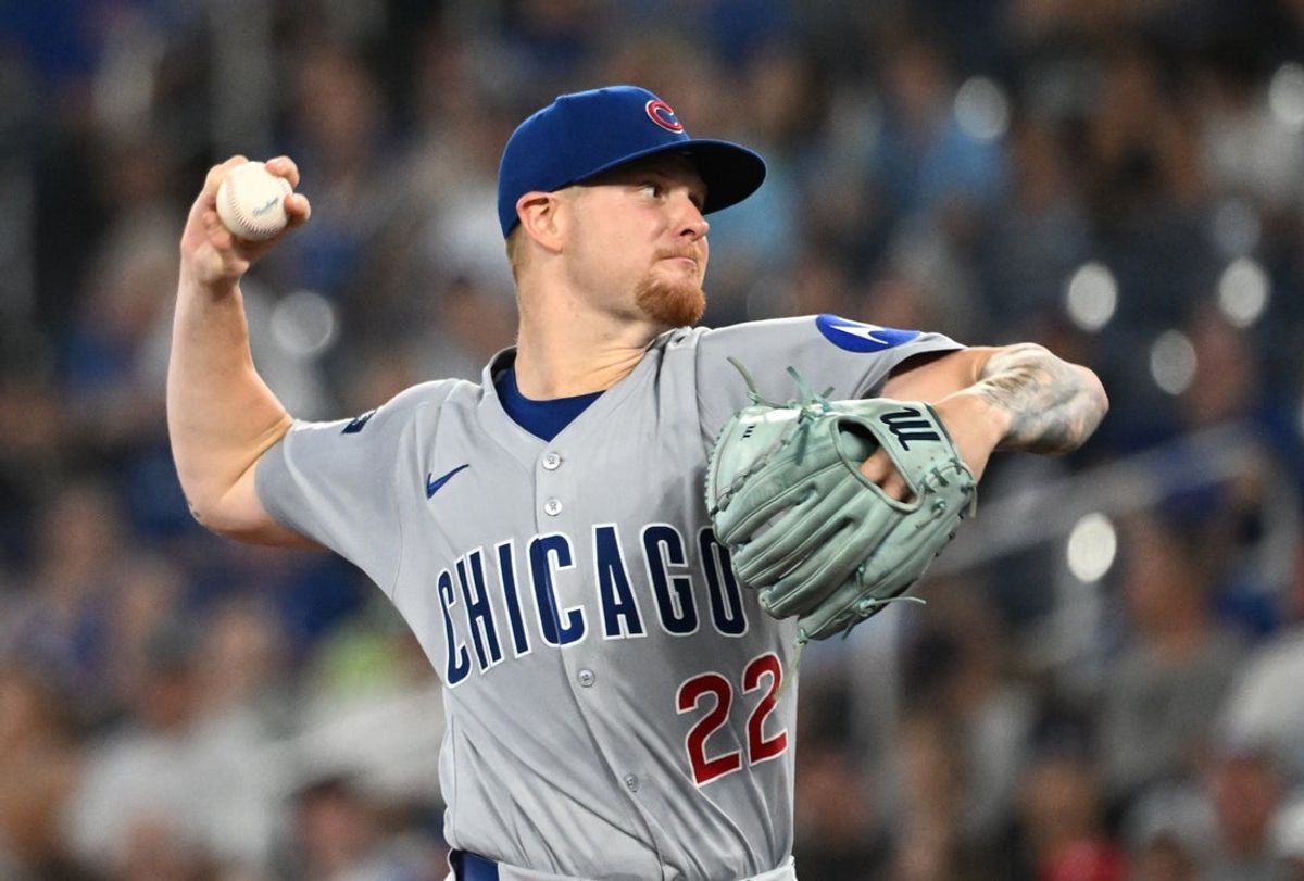 Aug 13, 2025; Toronto, Ontario, CAN;  Chicago Cubs starting pitcher Cade Horton (22) delivers a pitch against the Toronto Blue Jays in the first inning at Rogers Centre. Mandatory Credit: Dan Hamilton-Imagn Images