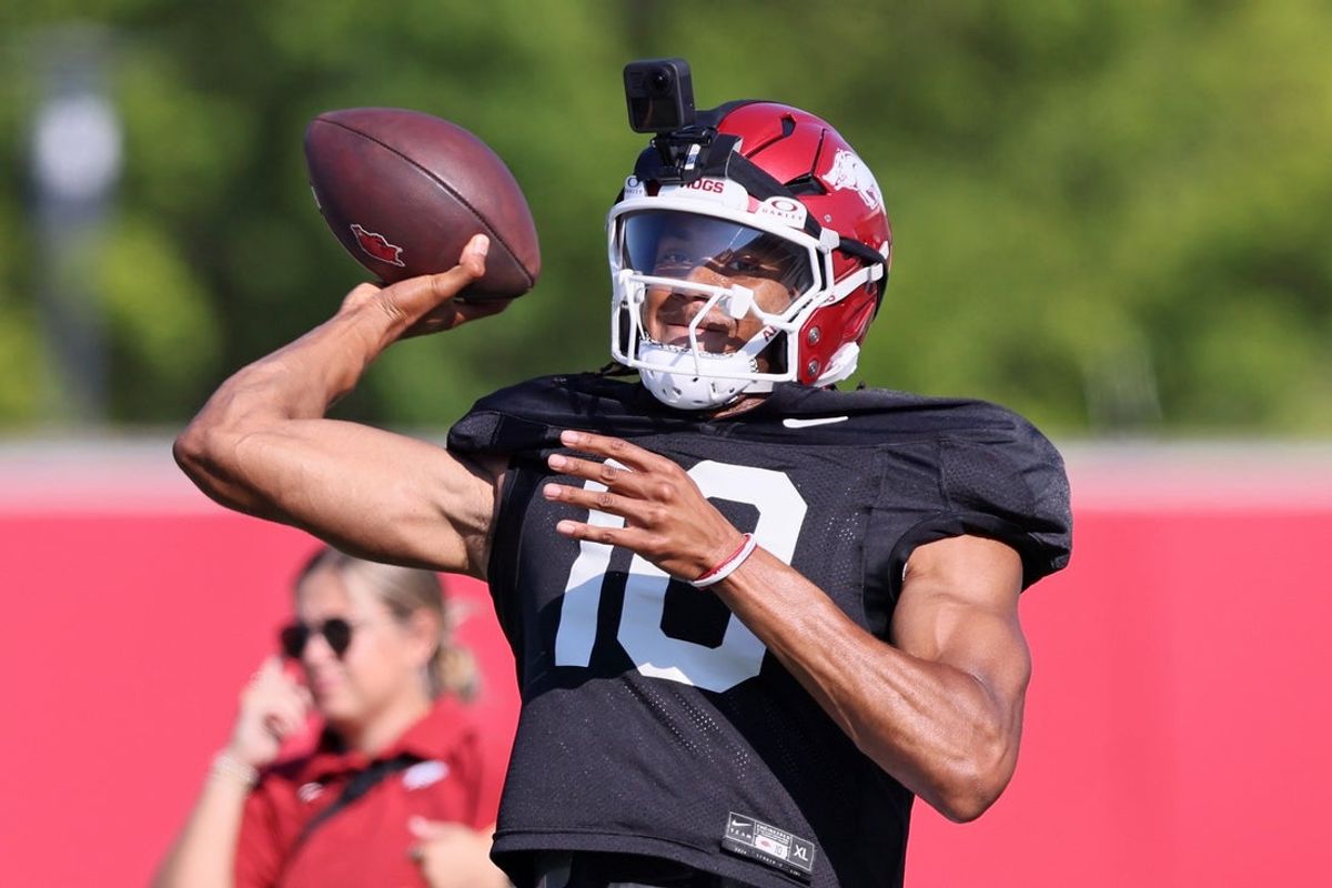 Aug 14, 2025; Fayetteville, AR, USA; Arkansas Razorbacks quarterback Taylen Green (10) passes during practice. Mandatory Credit: Nelson Chenault-Imagn Images