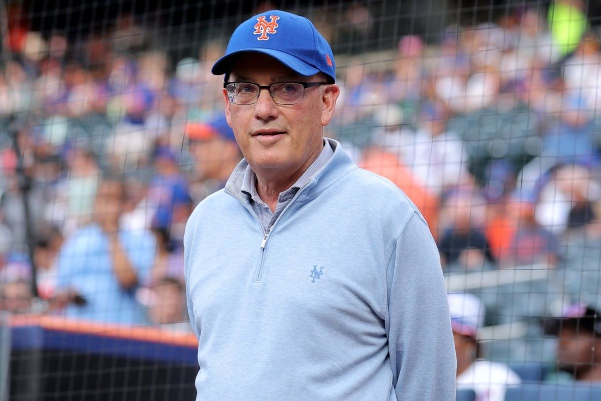 Aug 14, 2025; New York City, New York, USA; New York Mets owner Steve Cohen stands on the field before a ceremony to honor first baseman Pete Alonso (not pictured) for breaking the Mets all time home run record before a game against the Atlanta Braves at Citi Field. Mandatory Credit: Brad Penner-Imagn Images