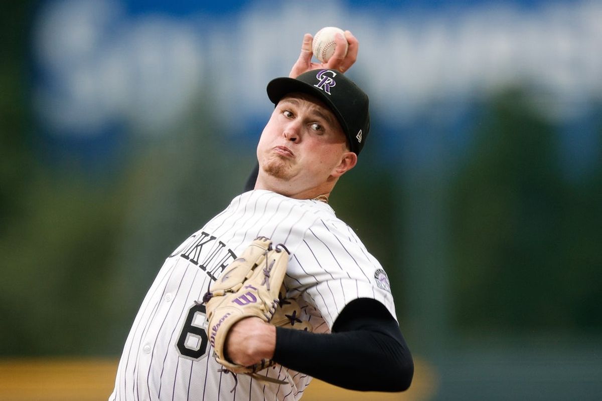 Aug 14, 2025; Denver, Colorado, USA; Colorado Rockies starting pitcher Bradley Blalock (64) pitches in the first inning against the Arizona Diamondbacks at Coors Field. Mandatory Credit: Isaiah J. Downing-Imagn Images